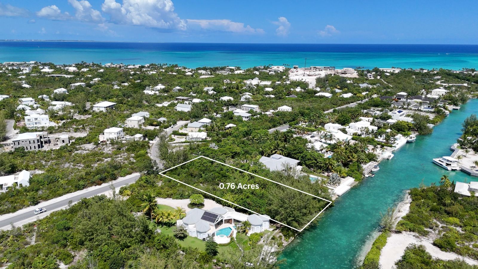 The 0.76 acre lot outlined beside the canal